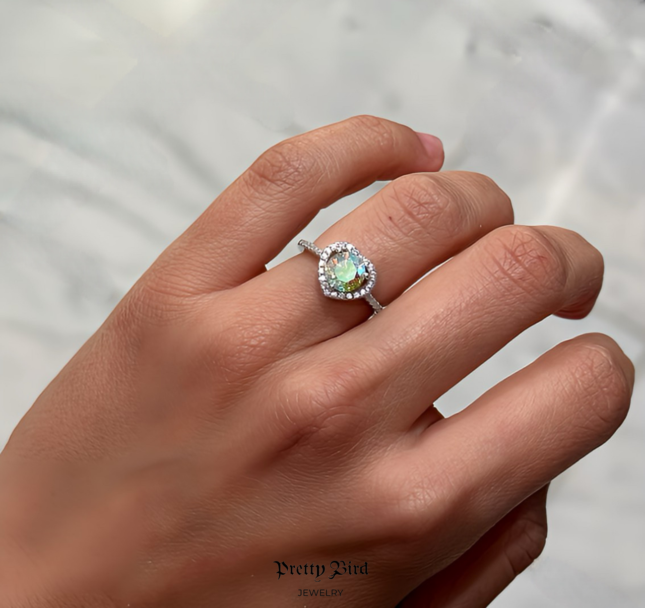 1ct Rainbow Moissanite Solitaire In Heart Setting